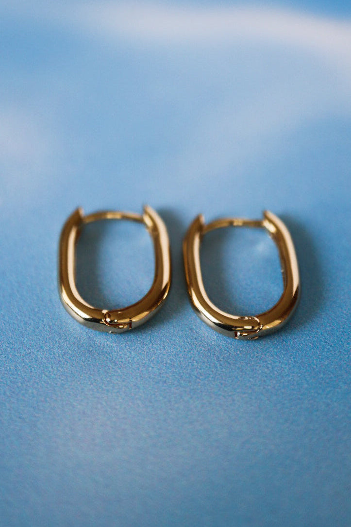 Gold hoops alargados