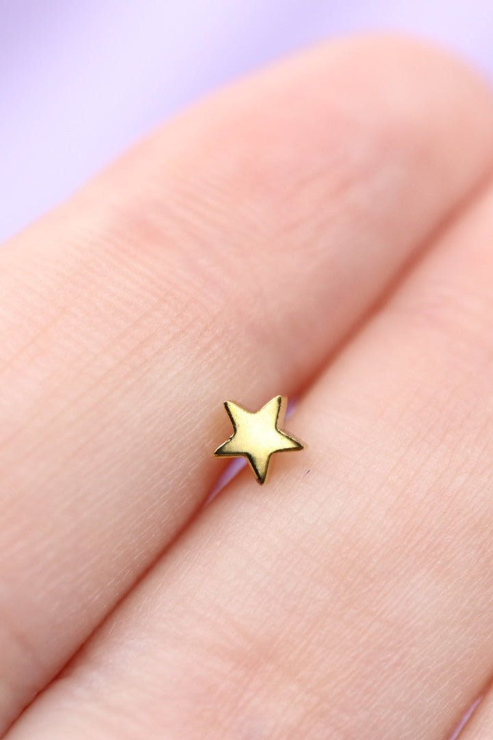 Piercing estrella de Oro