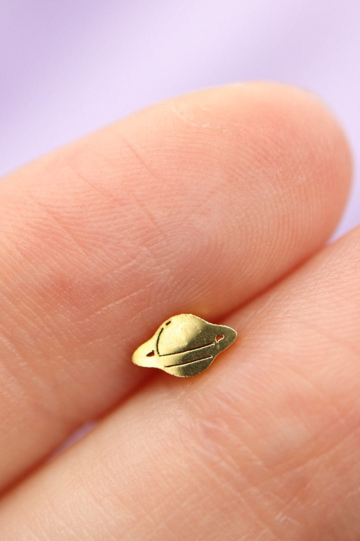 Piercing planeta de Oro